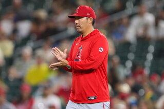 AP photo: Kurt Suzuki manages the Angels